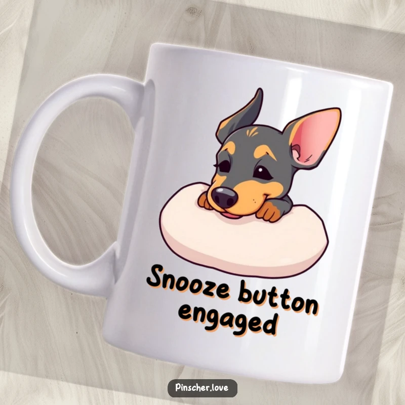 Funny dog mug featuring a Pinscher resting its chin on a soft cushion, exuding contentment with a sigh.