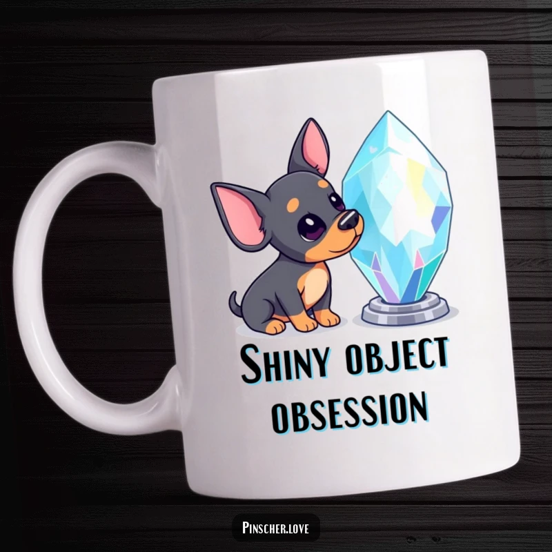 Funny Pinscher mug showing a curious Pinscher dog tilting its head, eyes wide with fascination at a large, sparkling gemstone.