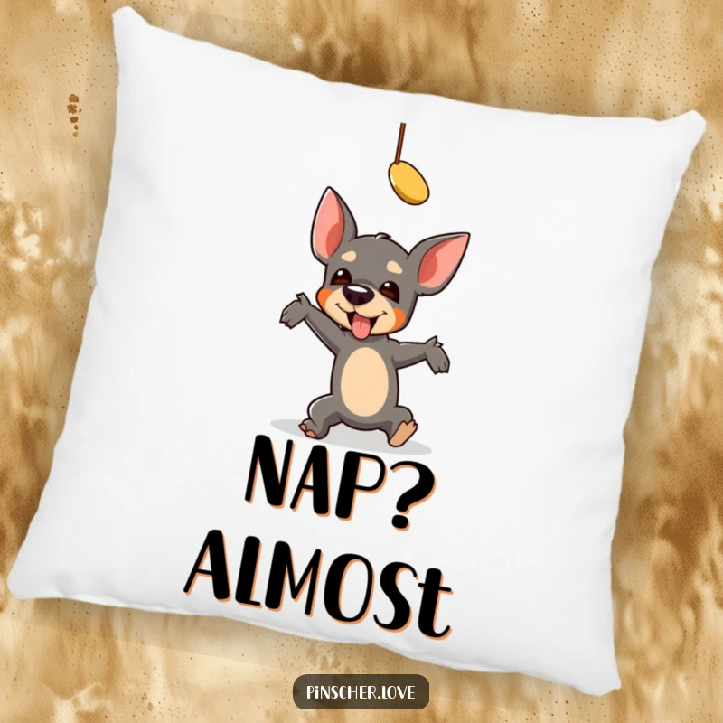 Funny Pinscher Pillow: A pinscher comically falls while reaching for a toy, bringing hilarious, relatable comfort and charm to any room.