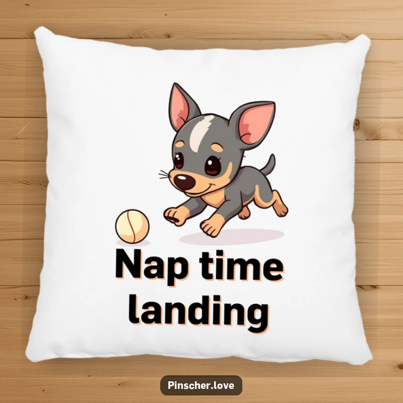 Funny Pinscher pillow, soft cushion with dog character playfully tripping while chasing a small ball, cute mishap, gift.