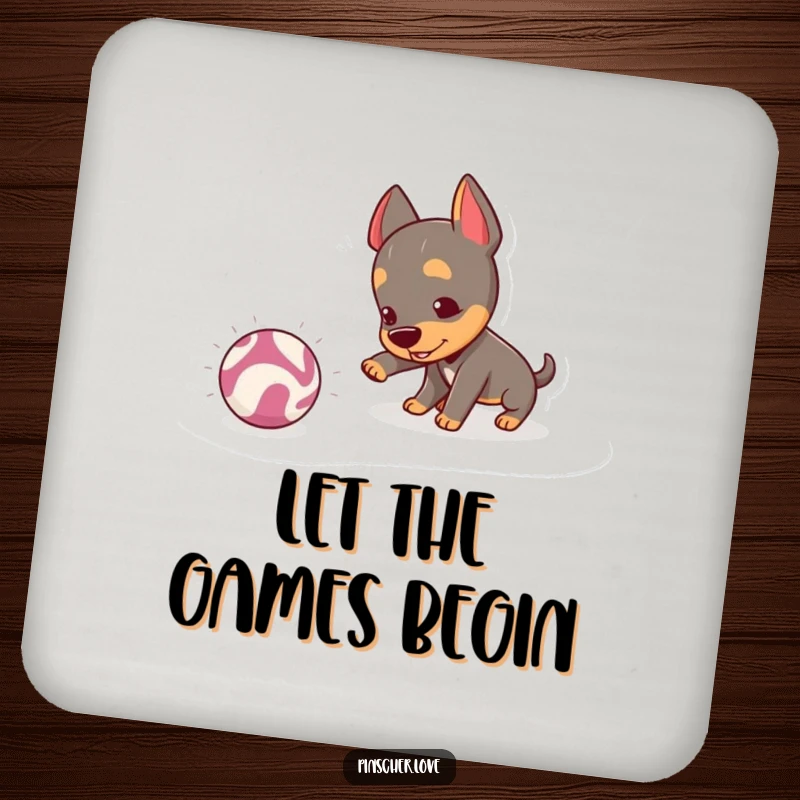 Funny Pinscher Coaster: A mischievous pinscher playfully nudges a bouncing, crinkly ball, adding a touch of playful fun to any beverage.