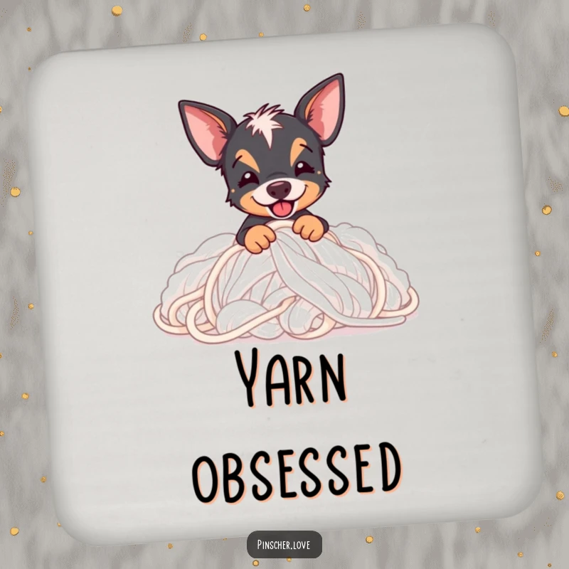 Funny Pinscher drink coaster featuring a Pinscher dog joyfully digging into a pile of soft, fluffy yarn.
