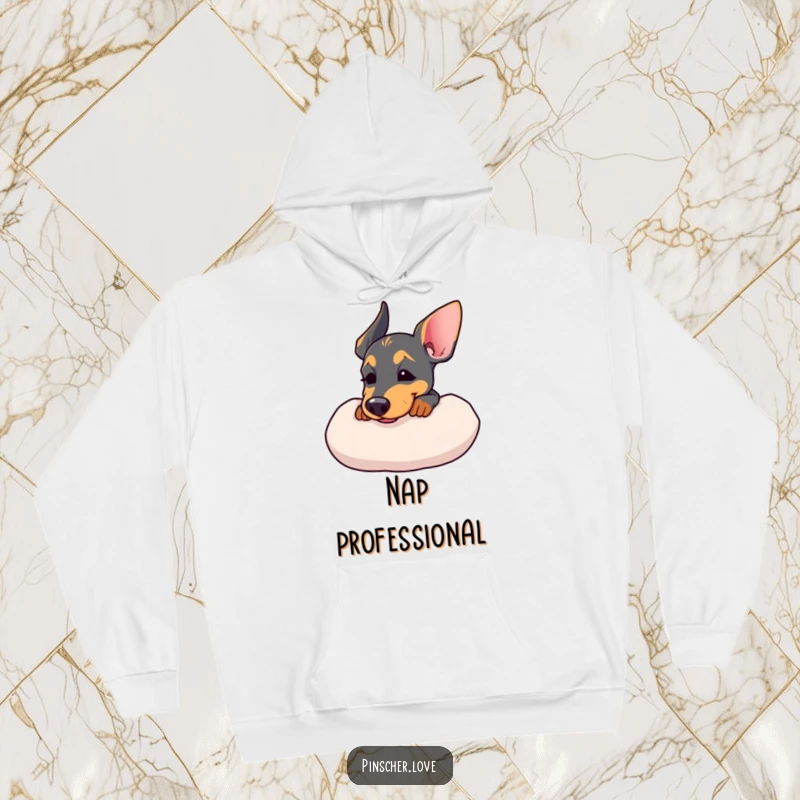 Funny dog hoodie featuring a Pinscher resting its chin on a soft, fluffy cushion with a contented sigh.