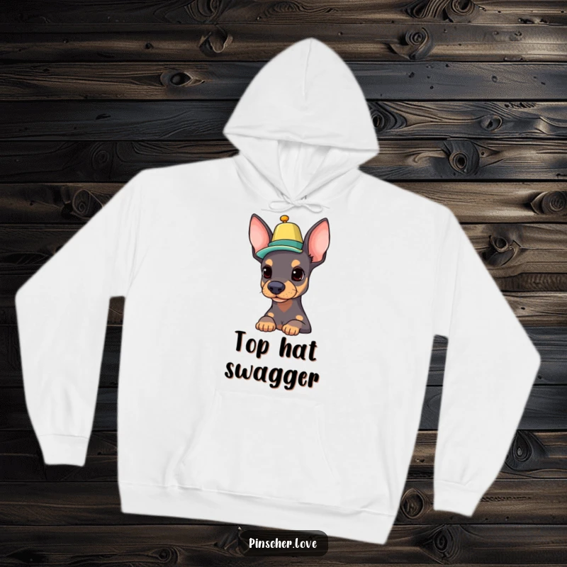 Funny Pinscher hoodie featuring a proud dog balancing a colorful hat on its nose, perfect for cozying up with stylish vibes.
