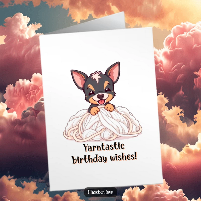 Funny Free Printable Birthday Card: Pinscher joyfully diving into a mountain of fluffy yarn, perfect for a birthday giggle.