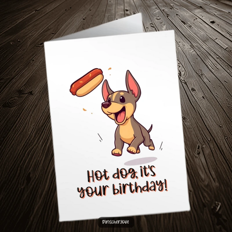 Funny Free Printable Birthday Card: Energetic Pinscher yipping wildly while chasing a tasty flying hotdog.