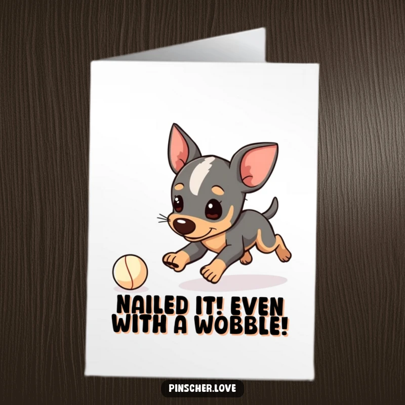 Funny Free Printable Congratulations Card showing a pinscher character comically tripping while chasing a tiny ball.