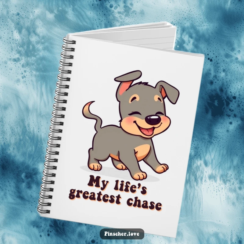 Funny pinscher notebook with a giggling dog character humorously chasing its wagging tail, ideal for note-taking and creative brainstorming.
