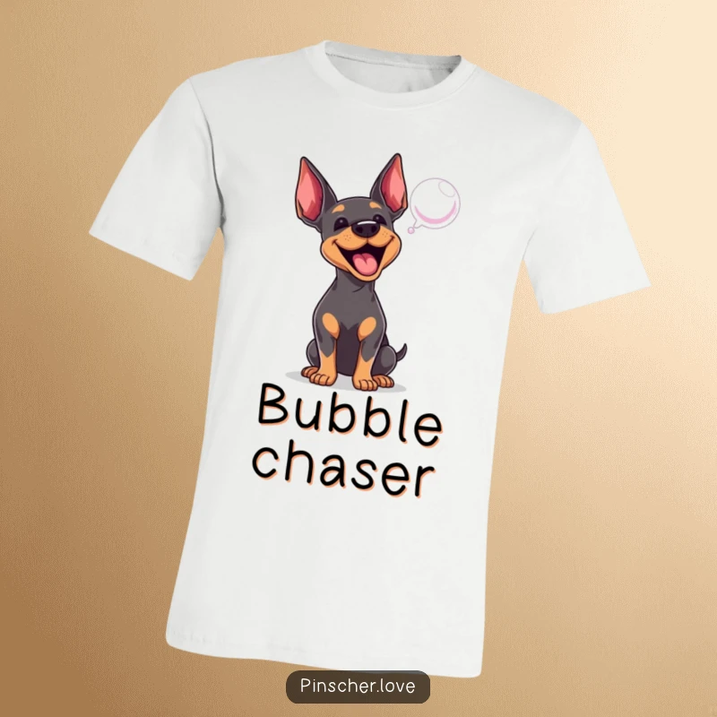 Funny Pinscher t-shirt depicting an excited dog enthusiastically barking at a floating bubble, showcasing playful energy.