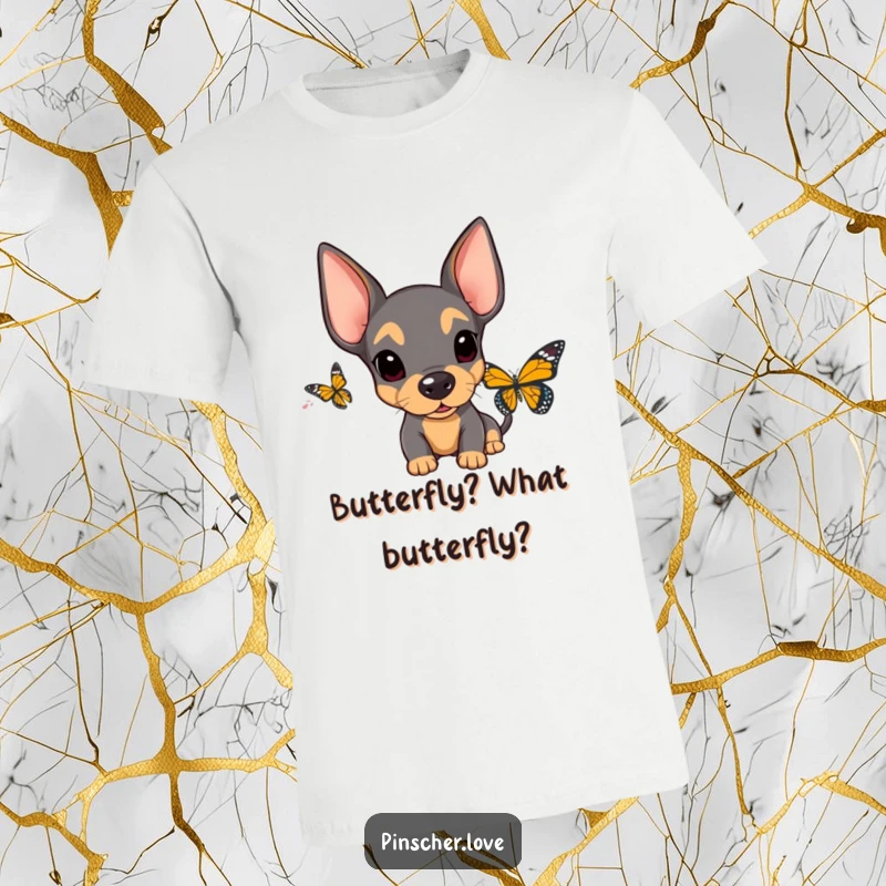 Funny Surprised Pinscher T-Shirt: A pinscher's floppy ears perk up as its eyes widen in comical surprise at an approaching butterfly.