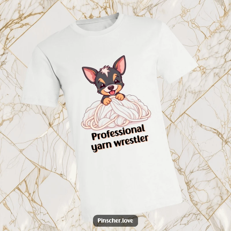 Funny Pinscher t-shirt featuring a happy Pinscher dog digging deep into a huge mound of colorful, soft yarn.