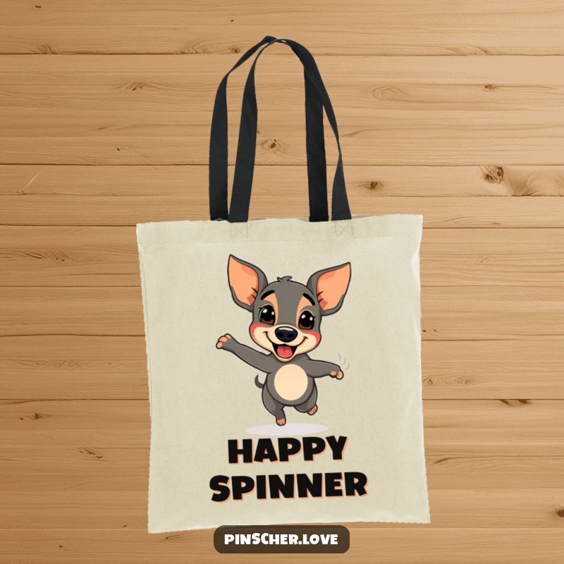 Funny Pinscher dog tote bag, spinning with delight and a blur of tail, representing pure happiness and excitement.