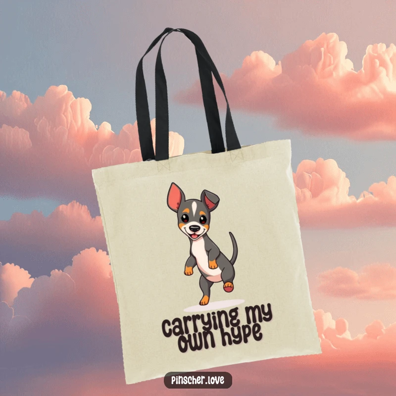 Funny Pinscher Tote Bag featuring a dog in a joyful spin, showcasing a playful and energetic canine character.